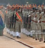 Police personnel take part in a service parade for Chief of Karnataka Police, Praveen Sood (not pictured) at the Karnataka State Reserve Police Grounds in Bangalore on October 29, 2021. (Photo by Manjunath Kiran / AFP) (Photo by MANJUNATH KIRAN/AFP via Getty Images)
