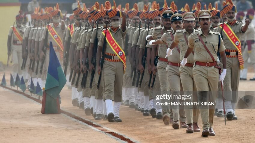 Police personnel take part in a service parade for Chief of Karnataka Police, Praveen Sood (not pictured) at the Karnataka State Reserve Police Grounds in Bangalore on October 29, 2021. (Photo by Manjunath Kiran / AFP) (Photo by MANJUNATH KIRAN/AFP via Getty Images)
